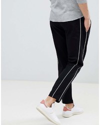 Черно-белые брюки чинос от Mango