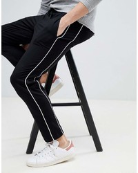 Черно-белые брюки чинос от Mango