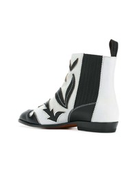 Черно-белые кожаные ботильоны от Santoni