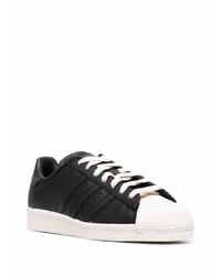 Мужские черно-белые кожаные низкие кеды от adidas