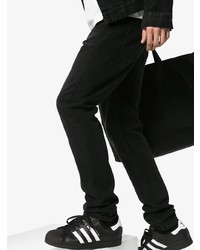 Мужские черно-белые кожаные низкие кеды от adidas