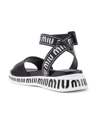 Черно-белые кожаные сандалии на плоской подошве от Miu Miu