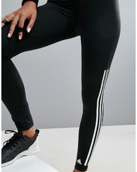 Черно-белые леггинсы в вертикальную полоску от adidas