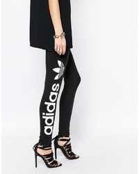 Черно-белые леггинсы с принтом от adidas