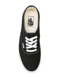 Мужские черно-белые низкие кеды из плотной ткани от Vans