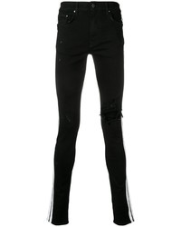 Мужские черно-белые рваные зауженные джинсы от Amiri