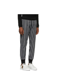 Мужские черно-белые спортивные штаны в вертикальную полоску от Dolce and Gabbana