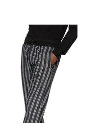 Мужские черно-белые спортивные штаны в вертикальную полоску от Dolce and Gabbana