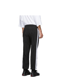 Мужские черно-белые спортивные штаны в вертикальную полоску от Palm Angels