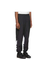 Мужские черно-белые спортивные штаны с принтом от adidas Originals