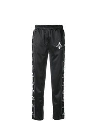 Женские черно-белые спортивные штаны с принтом от Marcelo Burlon County of Milan