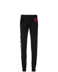 Женские черно-белые спортивные штаны от Love Moschino