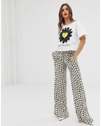 Черно-белые широкие брюки с цветочным принтом от Love Moschino