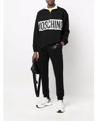 Мужской черно-белый свитер с воротником на молнии от Moschino