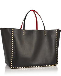 Черно-золотая кожаная большая сумка с шипами от Valentino