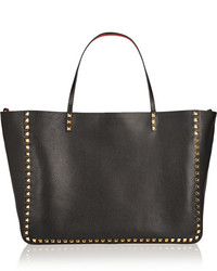 Черно-золотая кожаная большая сумка с шипами от Valentino