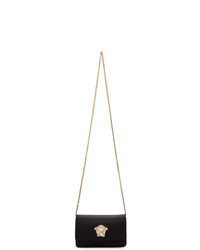 Черно-золотая кожаная сумка через плечо от Versace