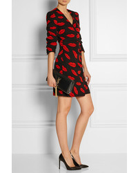 Черно-золотой кожаный клатч от Saint Laurent