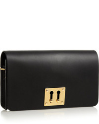 Черно-золотой кожаный клатч от Sophie Hulme