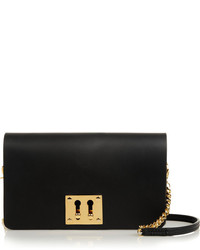 Черно-золотой кожаный клатч от Sophie Hulme