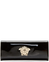 Черно-золотой кожаный клатч от Versace