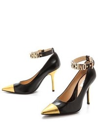 Черно-золотые кожаные туфли от Moschino