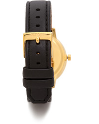 Женские черно-золотые кожаные часы от Nixon