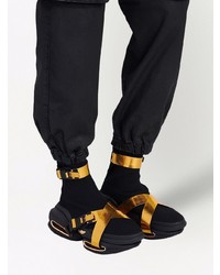 Мужские черно-золотые кроссовки от Balmain