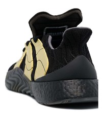 Мужские черно-золотые кроссовки от adidas