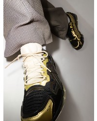 Мужские черно-золотые кроссовки от Asics