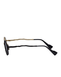 Мужские черно-золотые солнцезащитные очки от Kuboraum