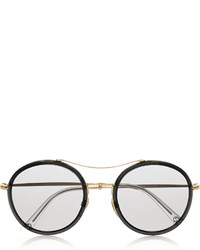 Женские черно-золотые солнцезащитные очки от Gucci