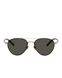 Мужские черно-золотые солнцезащитные очки от Linda Farrow Luxe