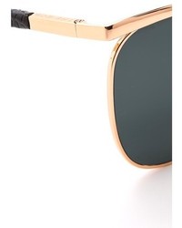 Женские черно-золотые солнцезащитные очки от The Row