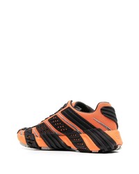 Мужские черно-оранжевые кроссовки от Diesel