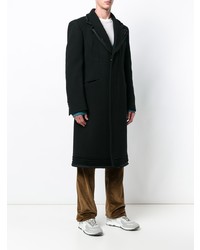 Черное длинное пальто от Maison Margiela