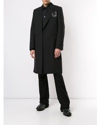 Черное длинное пальто от Undercover