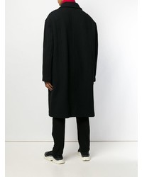 Черное длинное пальто от Raf Simons