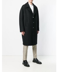 Черное длинное пальто от Neil Barrett