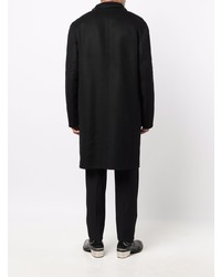 Черное длинное пальто от Alexander McQueen