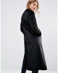 Женское черное пальто дастер от Helene Berman