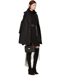 Черное пальто-накидка от Valentino