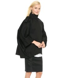 Черное пальто-накидка от Acne Studios