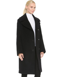 Черное пальто с меховым воротником от Acne Studios