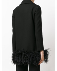 Женское черное пальто с перьями от Moschino