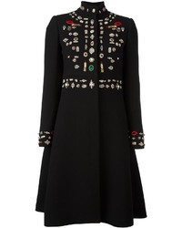Женское черное пальто с украшением от Alexander McQueen