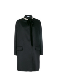 Женское черное пальто с украшением от Prada