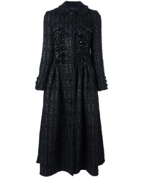 Женское черное пальто с украшением от Simone Rocha