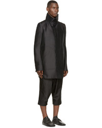 Мужское черное пальто от Thamanyah