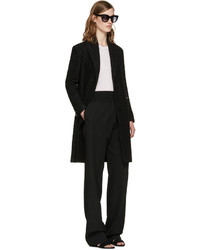 Женское черное пальто от Versus